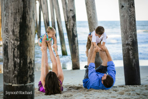 Family Pictures by the Fishing Pier in The Outer Banks of NC by Jayson and Rachael Photography