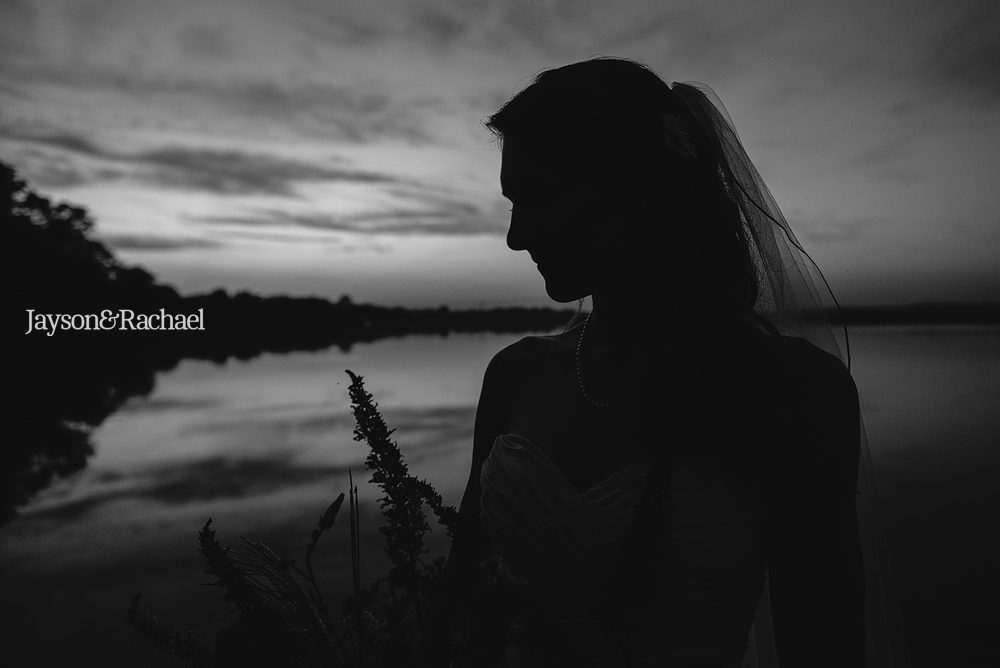 Bridal portraits on a dock by the river