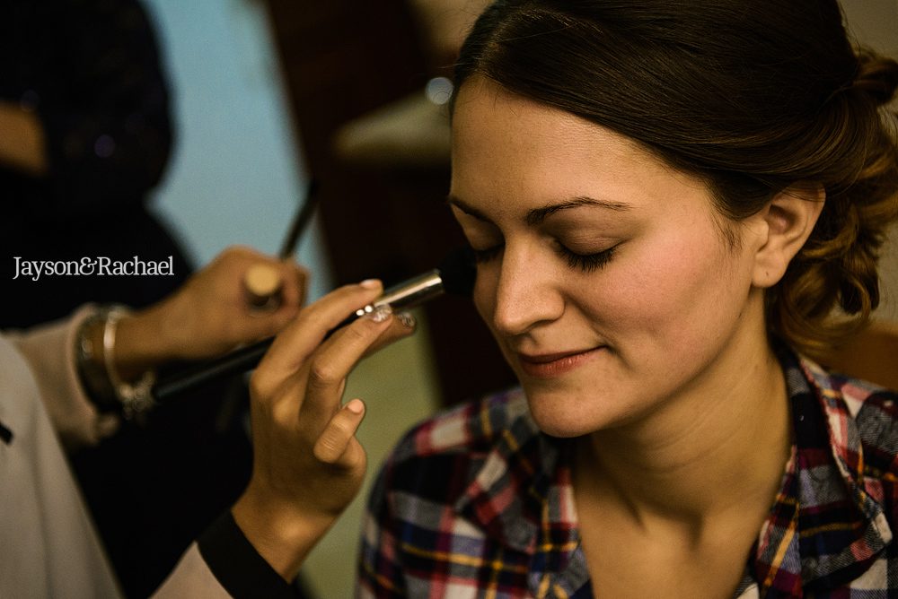 Williamsburg bride getting her makeup done on the wedding day